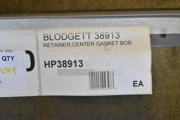 Blodgett HP38913 Center Gasket Retainer, brand new with barcode label; part of auction bundle including racks and supports.