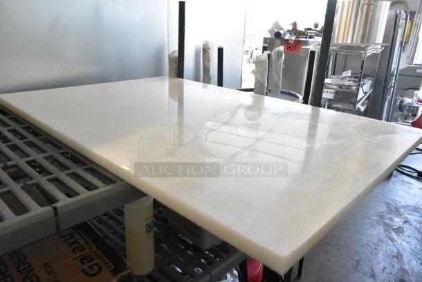 Brand new white cutting board, minor scratches. Durable, ideal for kitchen use. High-quality material. Size: large.