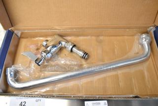 Brand new scratch and dent Waterloo 750AF14 14" pre-rinse add-on faucet in box, chrome finish, includes necessary fittings.