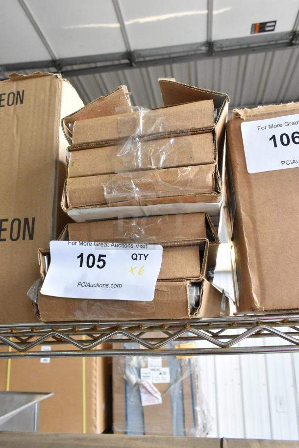 6 new boxes of Gilbert 10226042 5"x17" glueboards, scratch and dent condition, quantity label shows QTY x6.