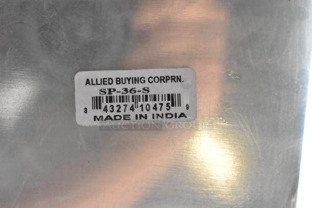 Brand new stainless steel mixing paddle, model SP-36-S. Label reads "Allied Buying Corp.," made in India. Scratch and dent.