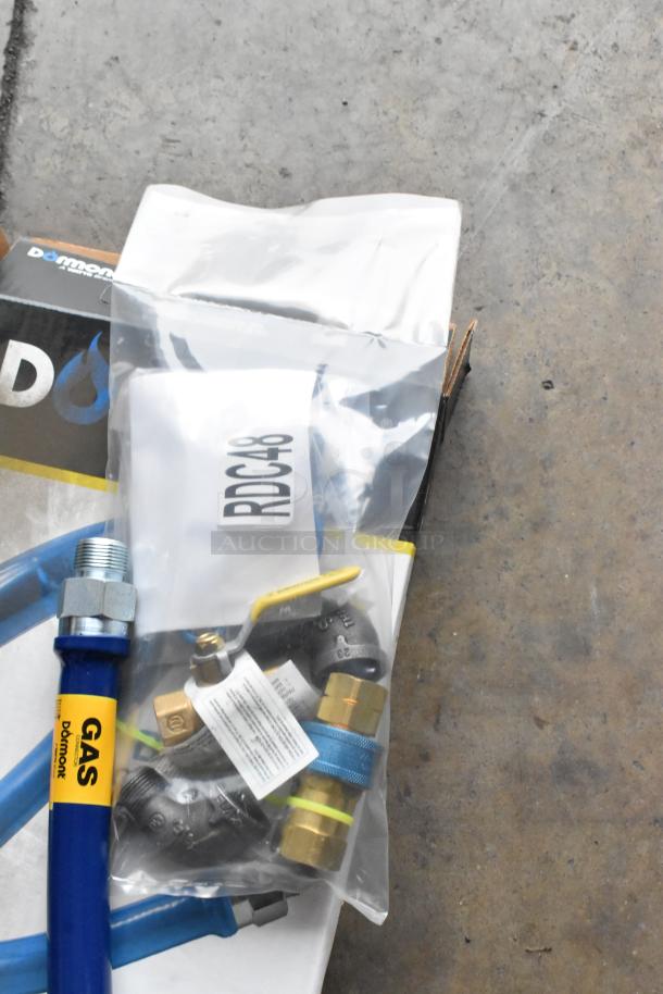 BRAND NEW Dormont 1675KIT48 48" gas connector kit, includes 3/4" male/male couplings, visible packaging, slight box wear.