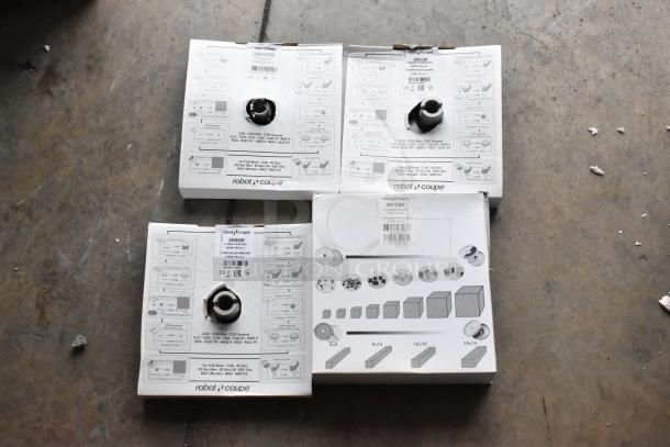 Four brand new Robot Coupe food processor blades, models 28059W, 28053W, 28112W, 28065W, in original packaging.