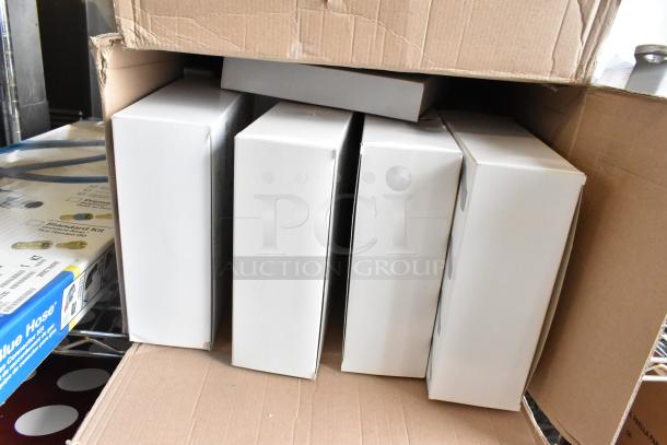 14 new Robot Coupe food processor blades in white boxes, including models 28135W, 28114W, 28112W, and more.