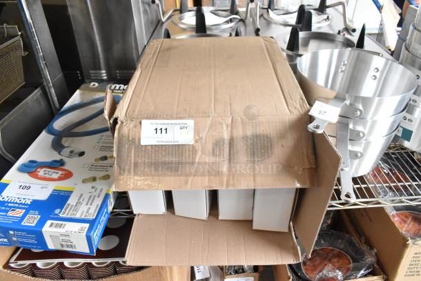 Cardboard box containing 14 brand new Robot Coupe food processor blades, models 28135W to 28062W, labeled "QTY x14."
