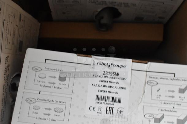 14 brand new Robot Coupe food processor blades, including models 28135W to 28195W, in original packaging.