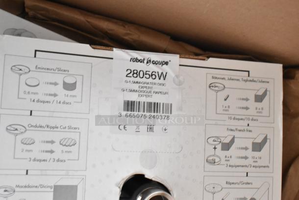 14 new Robot Coupe food processor blades, model numbers visible; includes 28056W grater disc with packaging. Complete set.