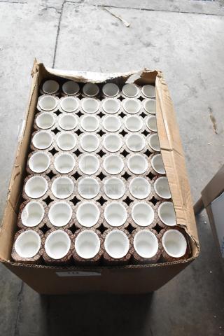 Box of muffin liners, item 10338419, brand new, some box damage. Contains rows of white liners in a cardboard box.