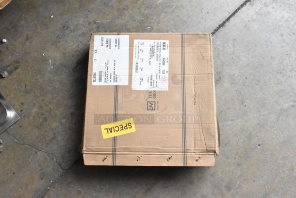 Brown cardboard box labeled "Special," containing Thunder Group 13.5" fryer screens and filter paper, scratch and dent condition.