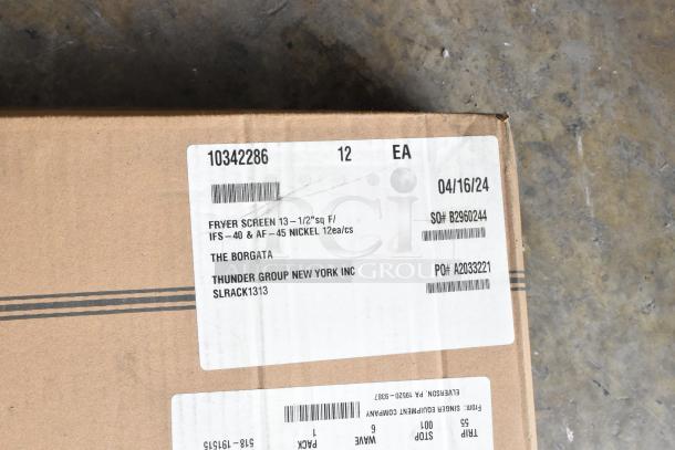 Two brand new scratch and dent boxes with Thunder Group 13.5" fryer screens, model 10342286. Labels show item details and codes.