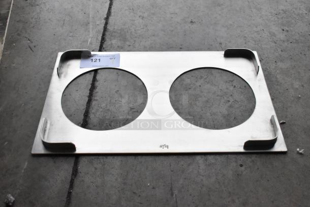 Brand new scratch and dent stainless steel 2-hole adapter plate, rectangular with circular cutouts, auction tag visible.