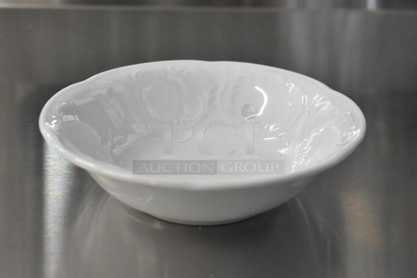 Brand new Bauscher Mozart bowl with intricate design, pristine condition, part of scratch and dent auction lot.