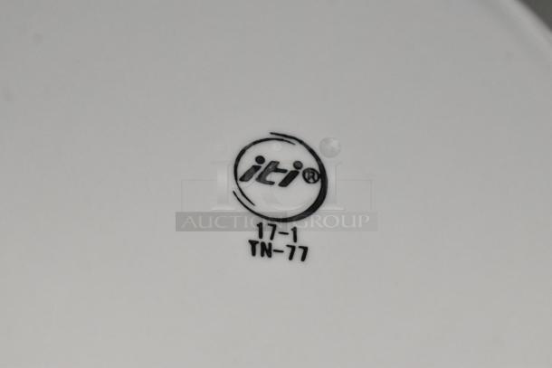 "ITI TN-77" plate marking on white ceramic. Part of new scratch and dent auction lot. Includes Bauscher Mozart bowls.