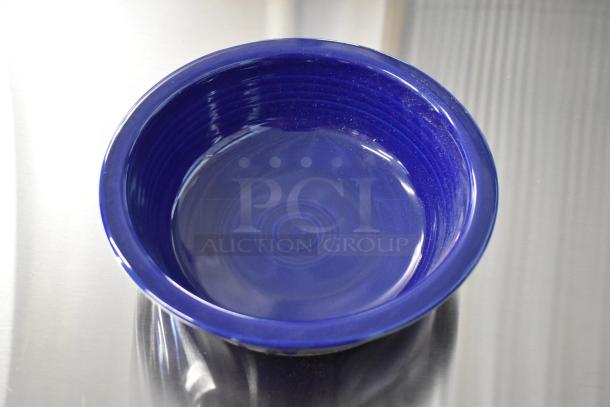 5 brand new Fiesta ceramic bowls, cobalt blue, scratch and dent condition, sold in boxes of 4, high-quality finish.