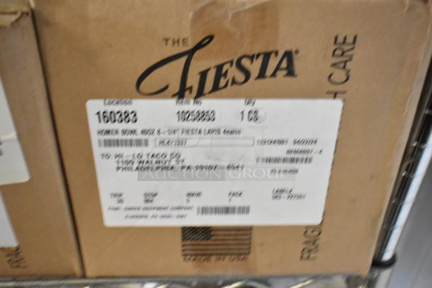 Box of Fiesta ceramic bowls, labeled "Homer Bowl 4052 2-1/4," marked as "Made in USA," condition noted as new with scratch and dent.