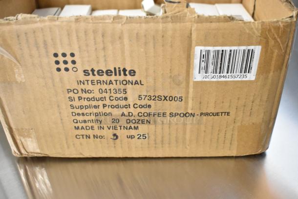 Cardboard box labeled "Steelite International", containing 20 dozen Steelite 5732SX005 coffee spoons, made in Vietnam.