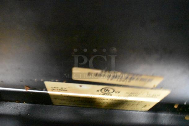 2 Great Lakes black metal cabinets, one missing a pane. Labels visible. Auction includes 2 times your bid.