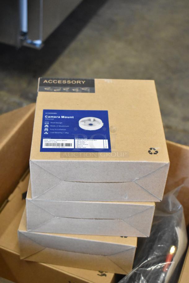 Three stacks of PFA137 camera mounts in brown boxes, labeled for easy installation. Brand new condition.