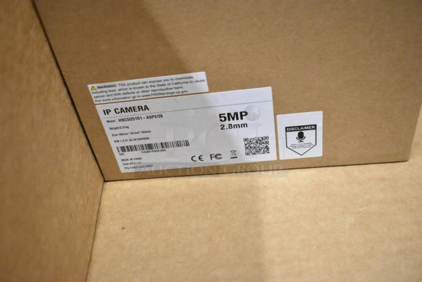 HNC5I251R1-ASPV/28 IP Camera box, 5MP, 2.8mm lens, new condition, label details specs, dimensions, and warnings.