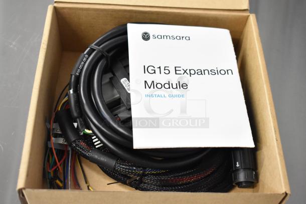 Samsara IG15 Expansion Module with install guide in box; wires, labels visible; scratch and dent condition.