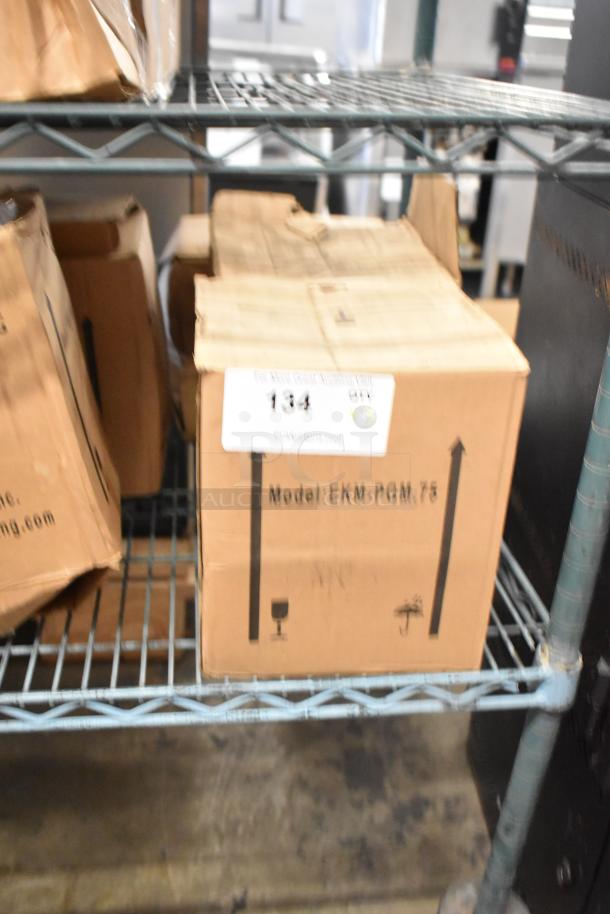 New EKM EKM-PGM.75 gas meter in box; visible label reads "Model: EKM-PGM.75." Box shows slight wear.