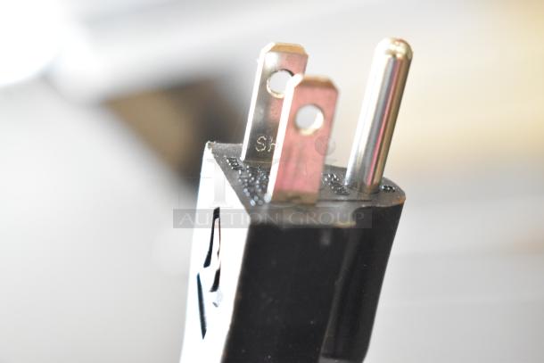 Close-up of a power plug for the Vulcan Stainless Steel Commercial Floor Style 2 Deck Steam Cabinet.
