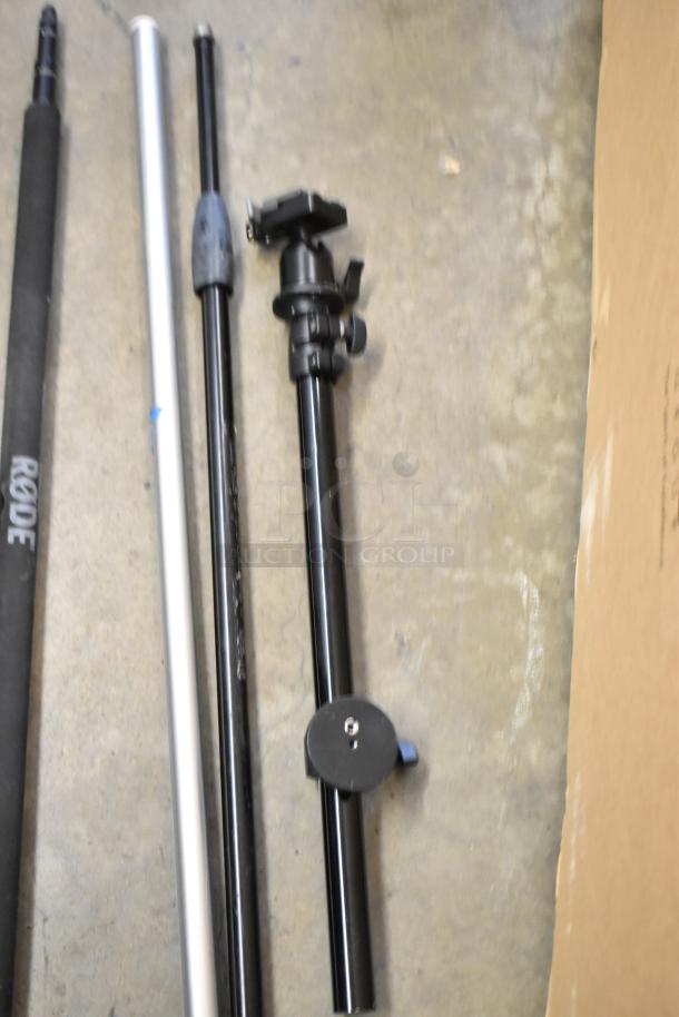 Soft case contents include several poles and a stand. One pole branded RØDE. Items appear gently used.