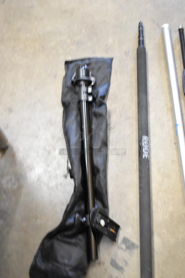 Soft case with contents including a Rode boom pole and mounting hardware. Items appear in used condition.