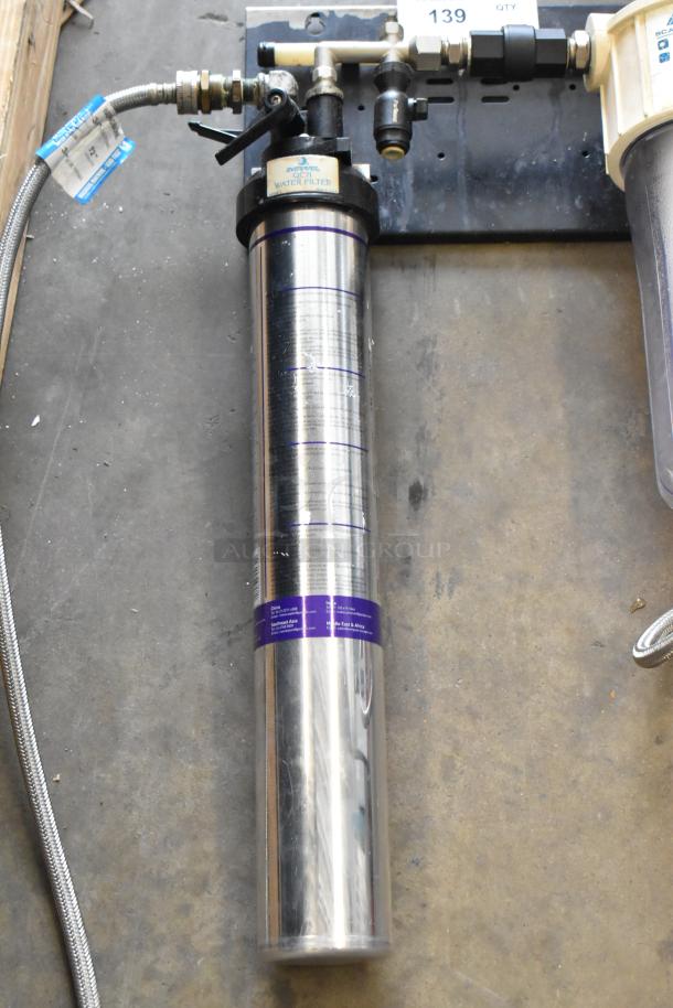 Everpure Kleensteam Water Filtration System, stainless steel, includes attached hoses, good condition, visible brand label.