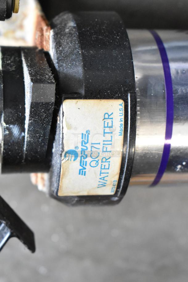 Everpure Kleensteam water filtration system, QC71 model, with visible wear. Label states "Made in U.S.A."