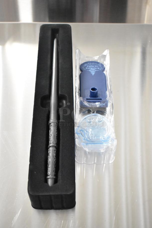 Harry Potter wand set with display, featuring detailed designs. Includes Expecto Patronum display part. In foam packaging.