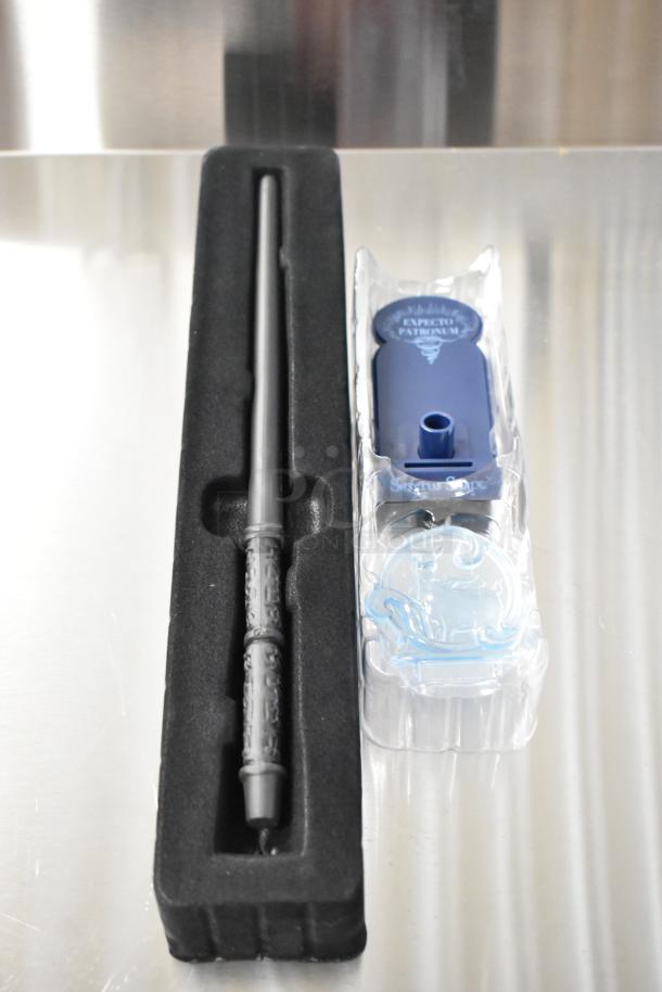 Set of 8 Harry Potter wands including Minerva McGonagall, Ron Weasley, and others in foam packaging. Excellent condition.