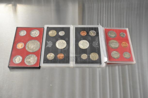 Four US Proof Coin Sets from 1968, 1969, 1975-1976, and 1980 in cases. Coins appear in excellent condition.