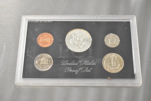United States Proof Coin Set, 1968, five coins in plastic display, mint condition, marked "Packaged by U.S. Mint."