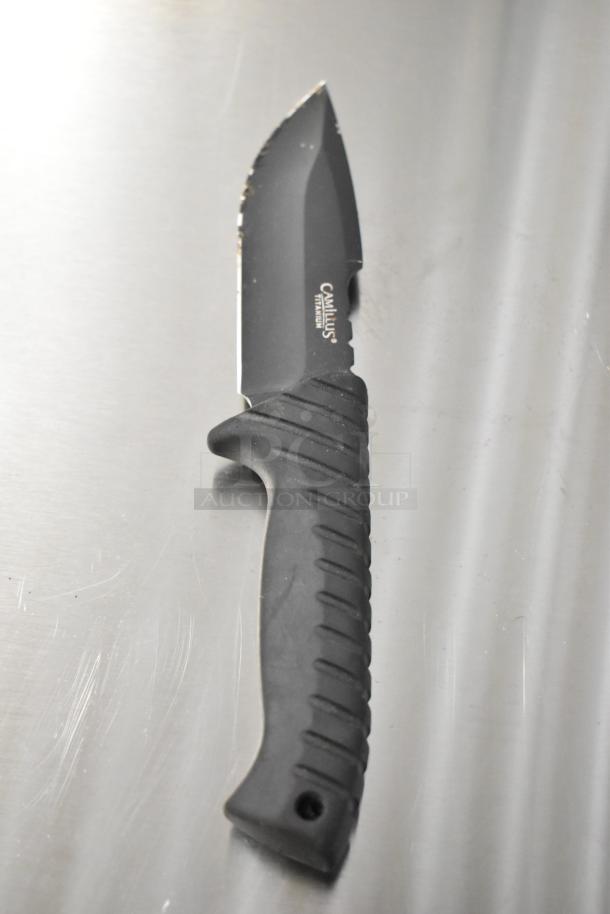 Camillus knife with black handle and titanium blade, showing "Camillus" brand engraving. Part of a 5-knife auction lot.