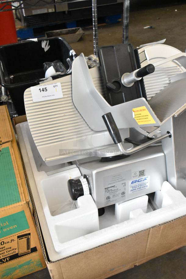 Bizerba GSP HD commercial meat slicer, metal design, 120V, 1 phase. Includes adjustment knobs and safety labels, excellent condition.