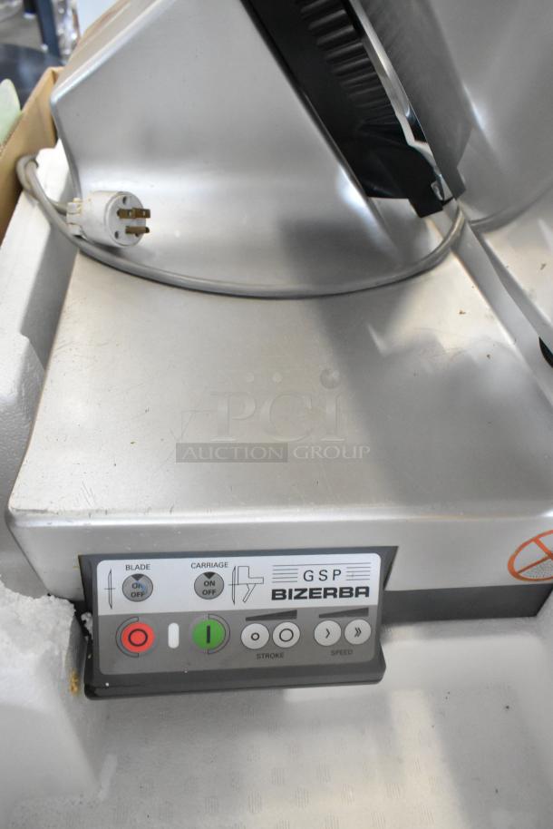Bizerba GSP HD metal meat slicer, commercial countertop model. Features controls for blade and carriage. 120 Volts, 1 Phase.
