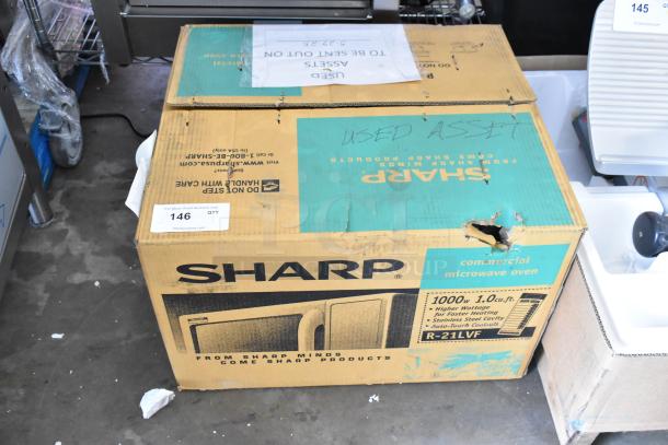 Amana RCS10TS stainless steel commercial microwave in original Sharp box, 120V, 1 Phase, box shows wear.