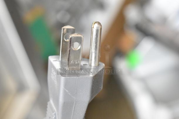 Close-up of the power plug for the 2016 Amana RCS10TS commercial microwave in original box. 120 volts, 1 phase.