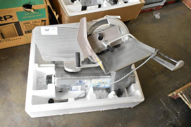 Bizerba SE 12 D US metal commercial meat slicer, 120 volts, 1 phase, in good condition. Model SE 12 D US visible.