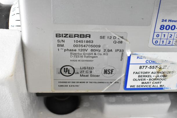 Bizerba SE 12 D US meat slicer label showing 120V, 1 phase, UL and NSF certifications. Made in Germany.