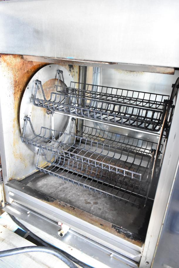 Fri-jado TDR 7 P stainless steel commercial rotisserie oven interior. Electric, 208V, 3-phase, used condition.