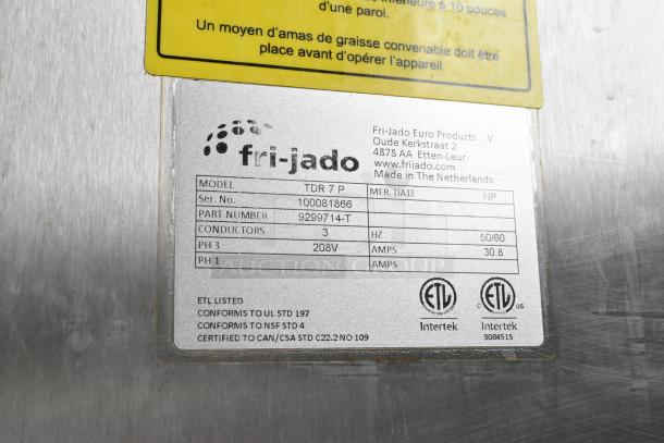Fri-jado TDR 7 P stainless steel commercial rotisserie oven label, 208V, 3 phase, model and part number visible.