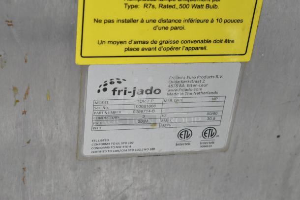 Fri-jado TDR 7 P stainless steel commercial electric rotisserie oven label. 208V, 3-phase, ETL listed. Model and part info visible.