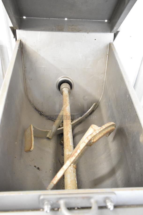 Hobart MG2032 metal commercial floor meat mixer, 208/240V, 3 phase, features interior paddles. Some wear visible.