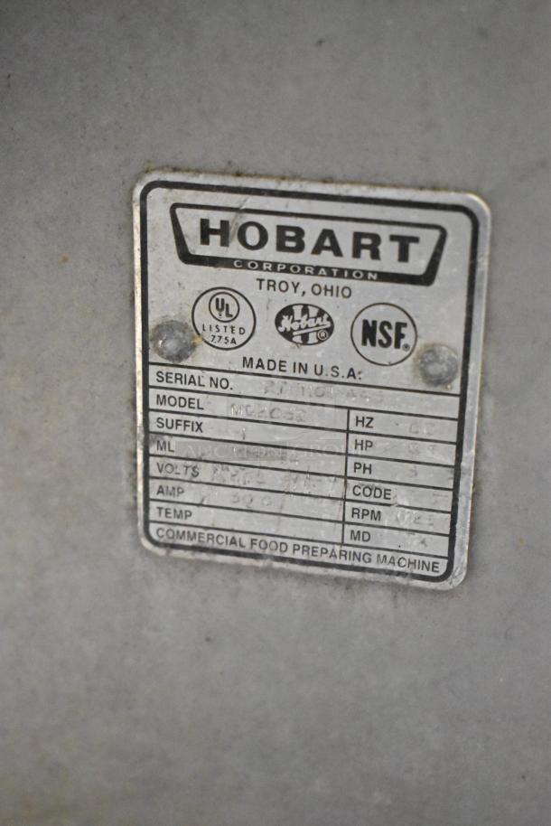 Hobart MG2032 commercial meat mixer plate showing model, voltage (208/240V), phase (3), and NSF certification.