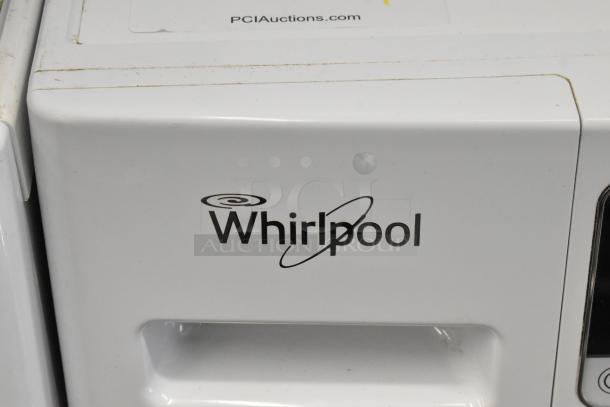 Whirlpool front load metal dryer, white, visible logo, part of control panel, PCI Auctions label.