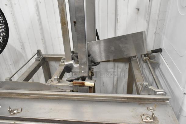 Hobart 6801 commercial meat saw, metal, floor style. 200-230 volts, 3 phase. Visible wear, sturdy construction.