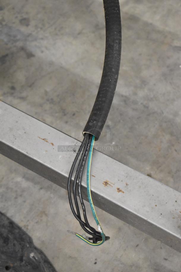 Hobart 6801 commercial meat saw power cord. Black and green wires exposed, condition unknown. 200-230V, 3-phase.
