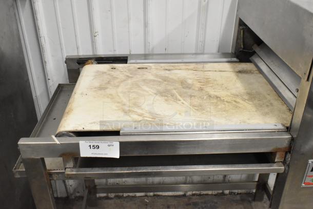 Bakri Co metal commercial floor dough sheeter, 250 volts, visible wear, auction tag number 159 displayed on front.
